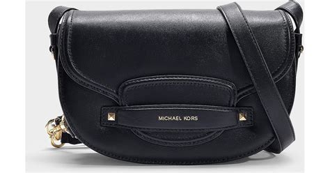 michael kors cary saddle bag bestel|Michael Kors quilted black bag.